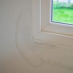 House,Wall,Near,The,Window,With,Some,Water,Stain,Show